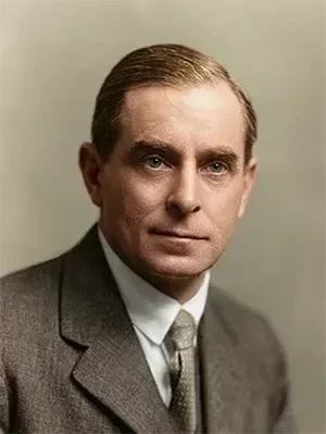Portrait photograph of Herbert Ashwin Budd in a suit and tie, looking directly forward.
